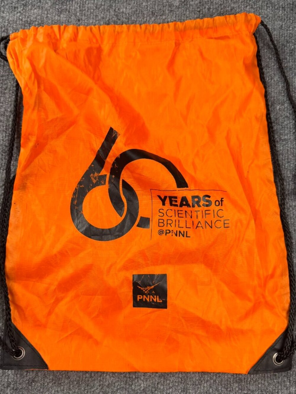 Vintage/Promo PNNL 60 Years Scientific Brilliance Orange Drawstring Bag